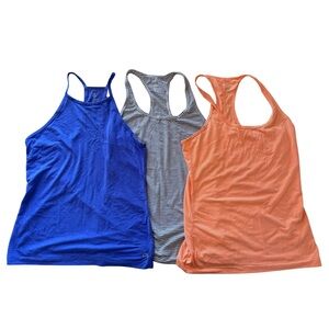 3/$20 GAP Fit Women's Set of 3 Tank Tops - Vibrant Blue, Striped Gray, Orange